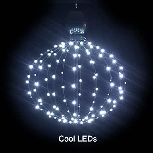 Photo taken in back yard  of a hanging GLOW powered by batteries. The symmetry is so beautiful.